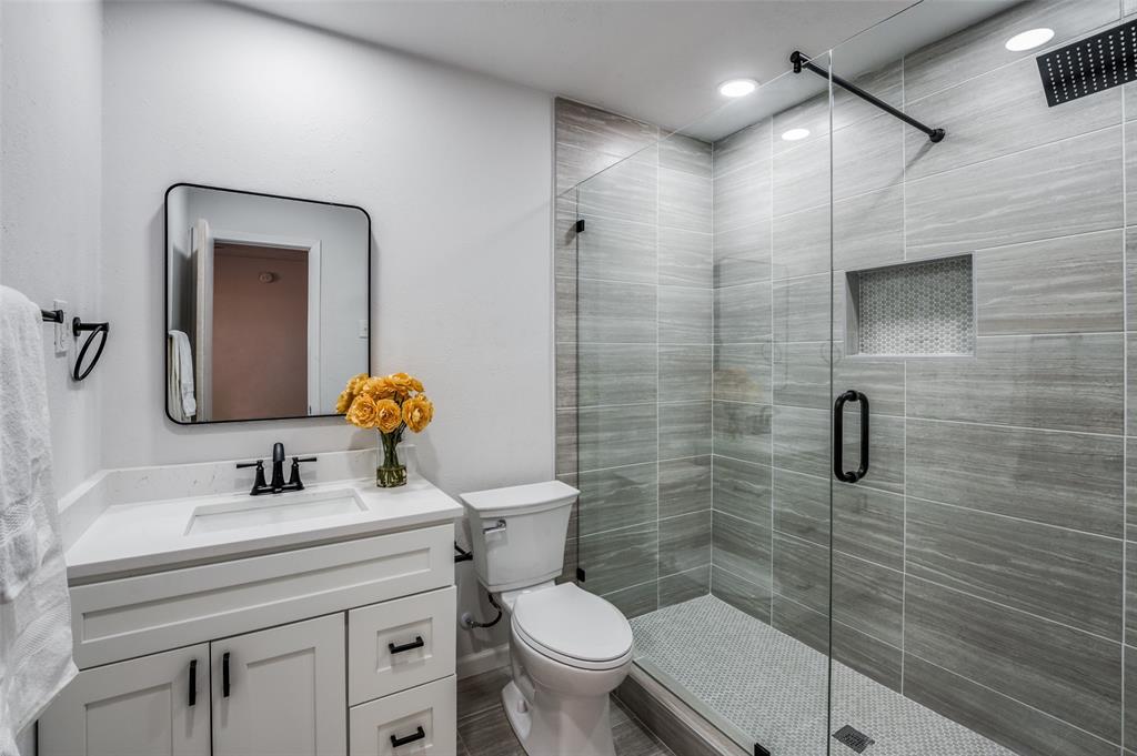 6000 Blue Ridge Trail Plano, TX 75023 - Photo 21 of 25 Full bathroom with a stall shower and vanity