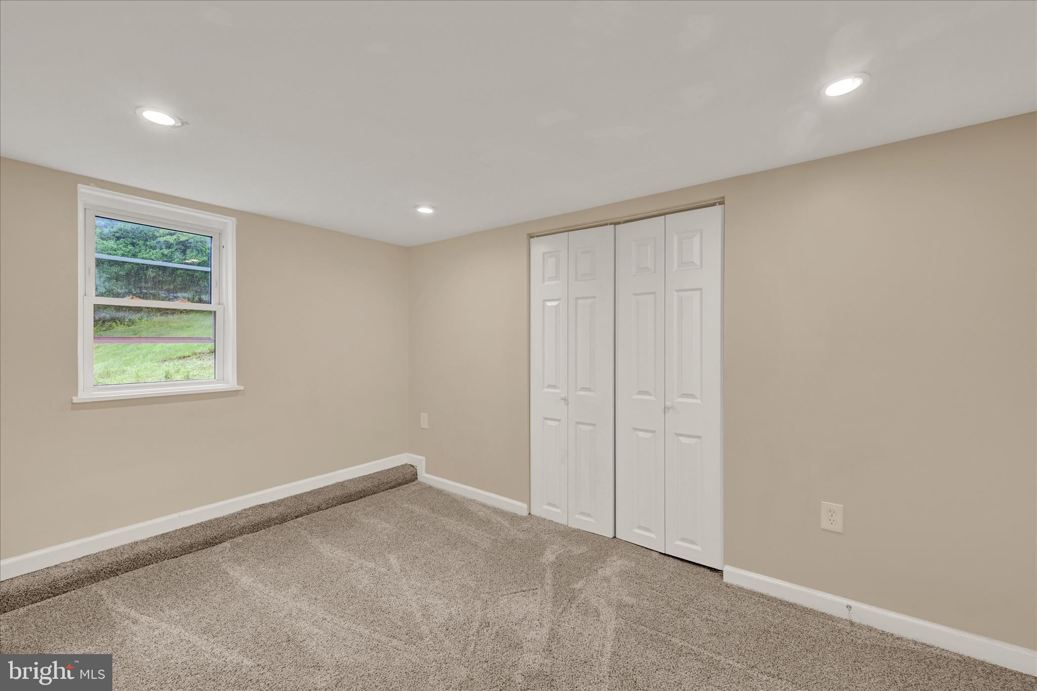 8511 Frederick Road Ellicott City, MD 21043 - Photo 22 of 36 an empty room with windows