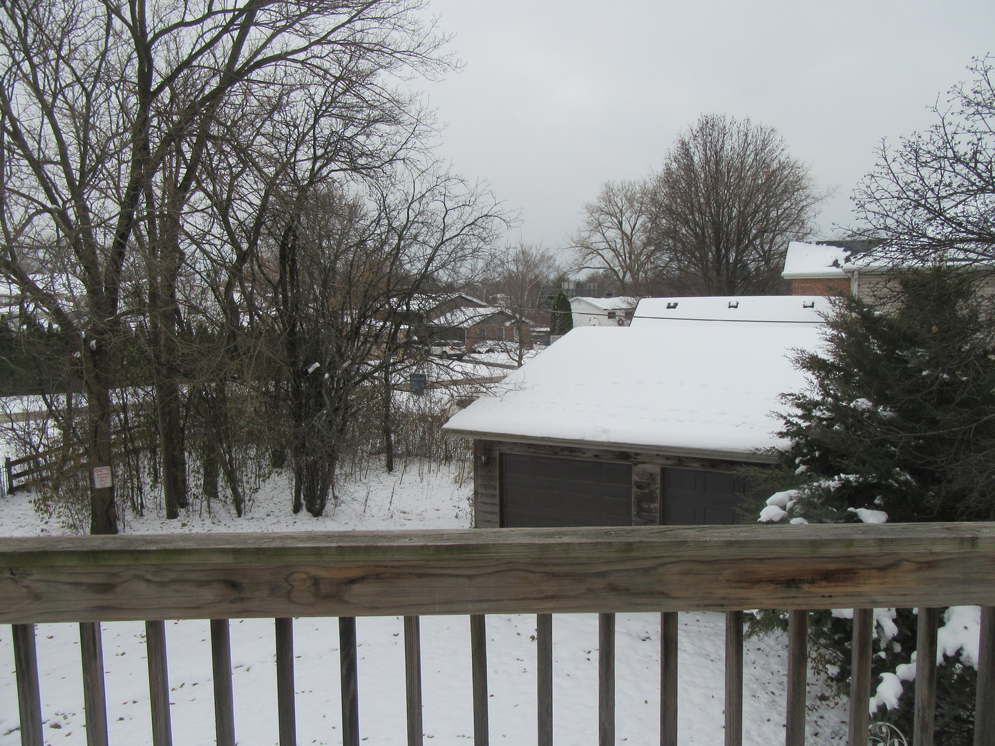 740 Jr Terrace Elmhurst, IL 60126 - Photo 14 of 22 a view of a wooden fence and a trees