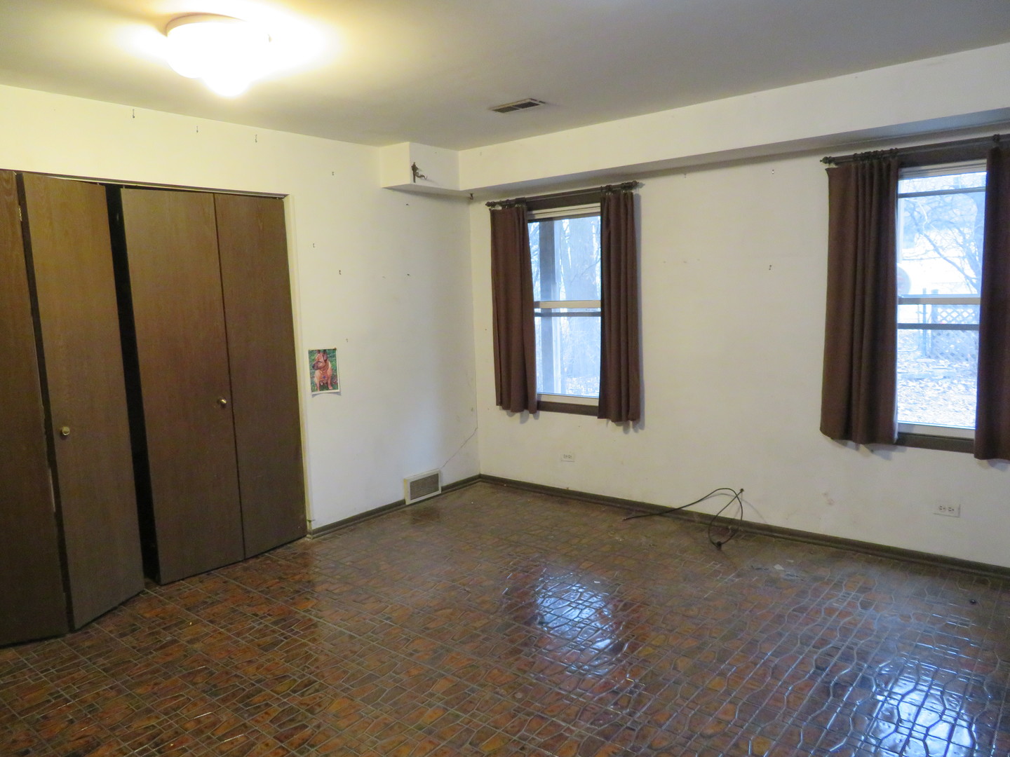 740 Jr Terrace Elmhurst, IL 60126 - Photo 3 of 30 an empty room with wooden floor and windows