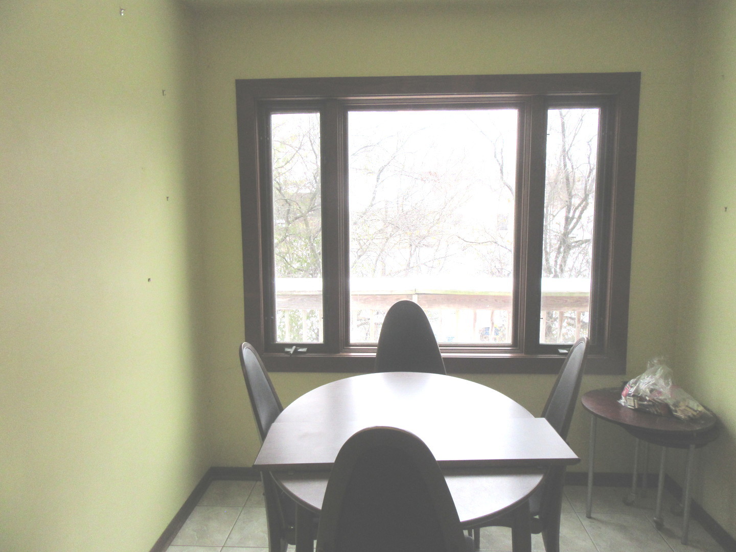 740 Jr Terrace Elmhurst, IL 60126 - Photo 9 of 23 a view of a dining room with a table and chairs
