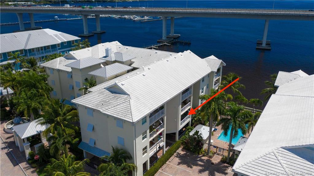 275 Northwest Flagler Avenue, Unit 205 Stuart, FL 34994 - Photo 2 of 43 an aerial view of a house with a yard