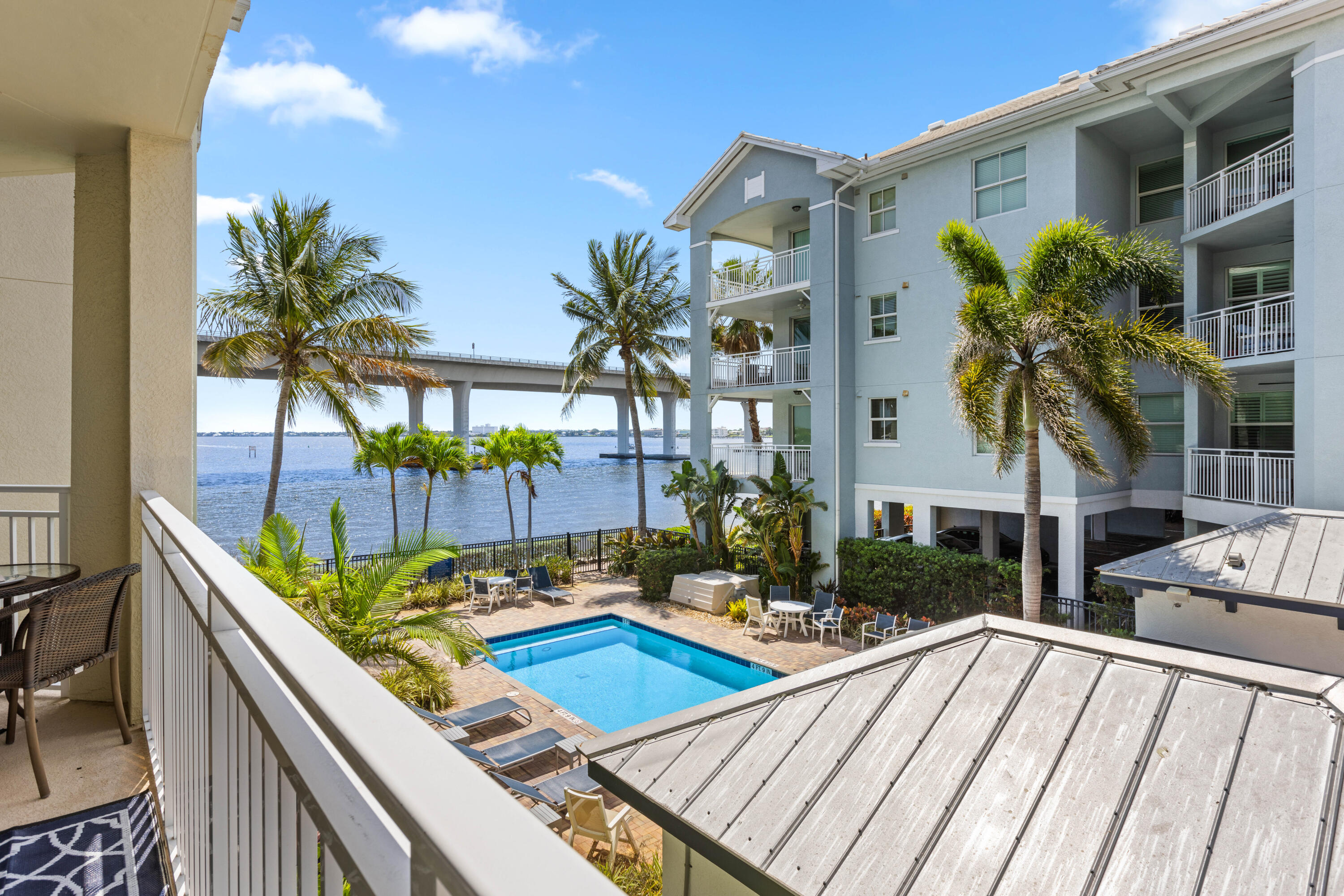 275 Northwest Flagler Avenue, Unit 205 Stuart, FL 34994 - Photo 25 of 43 a view of swimming pool with outdoor seating