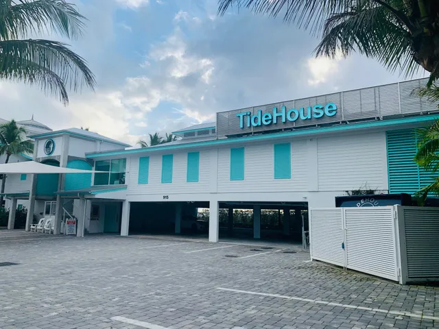 an outdoor space with patio furniture with wooden floor