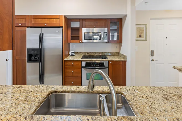 a kitchen with a stove and a microwave