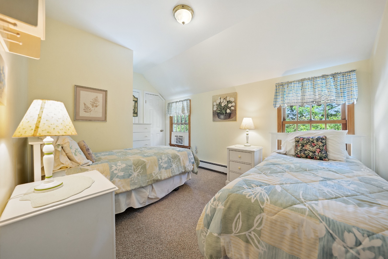 52 Pleasant Street Nantucket, MA 02554 - Photo 24 of 36 a bedroom with a bed and wooden floor
