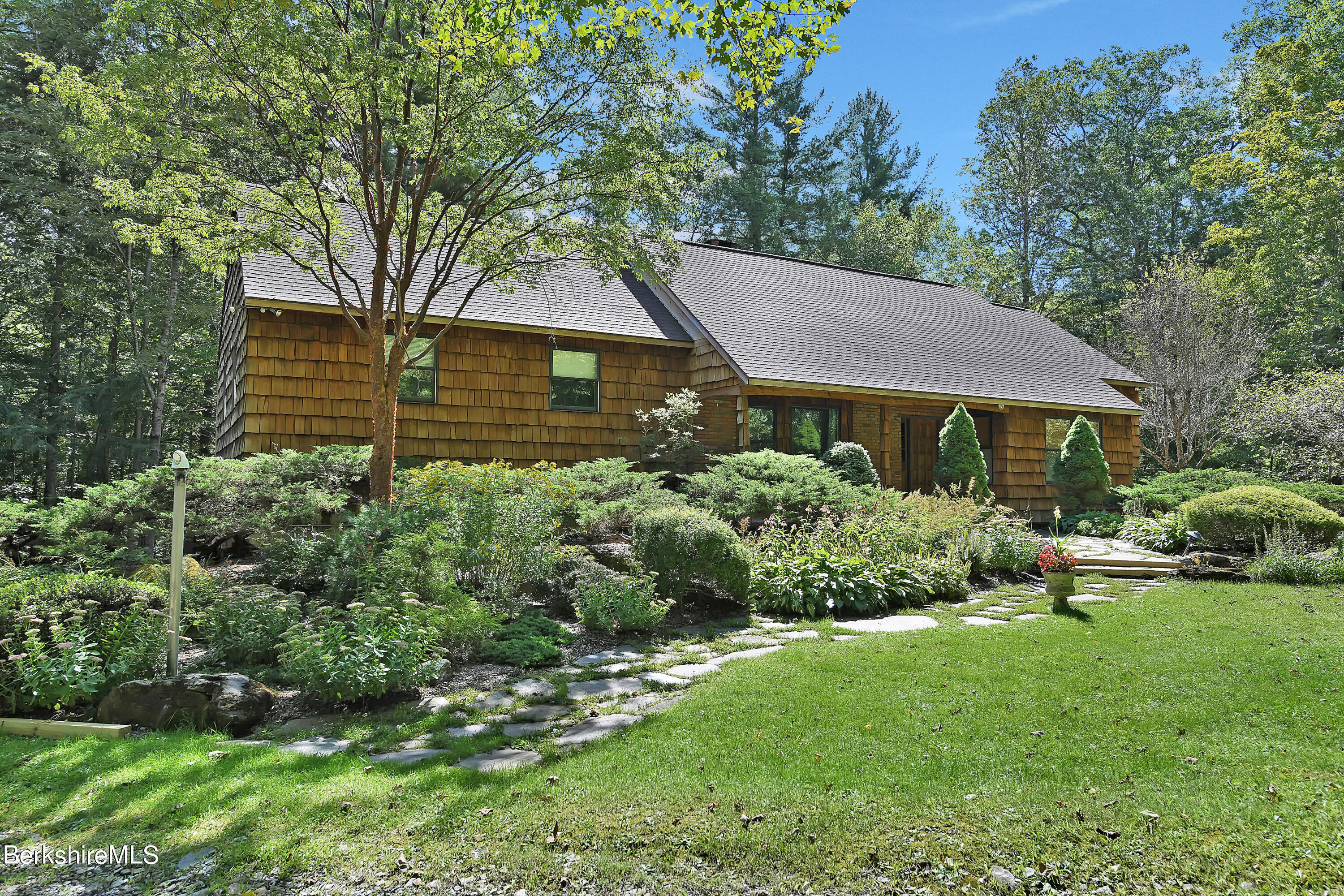 78 Scacebrook Road Richmond, MA 01201 - Photo 1 of 56 a front view of a house with a yard