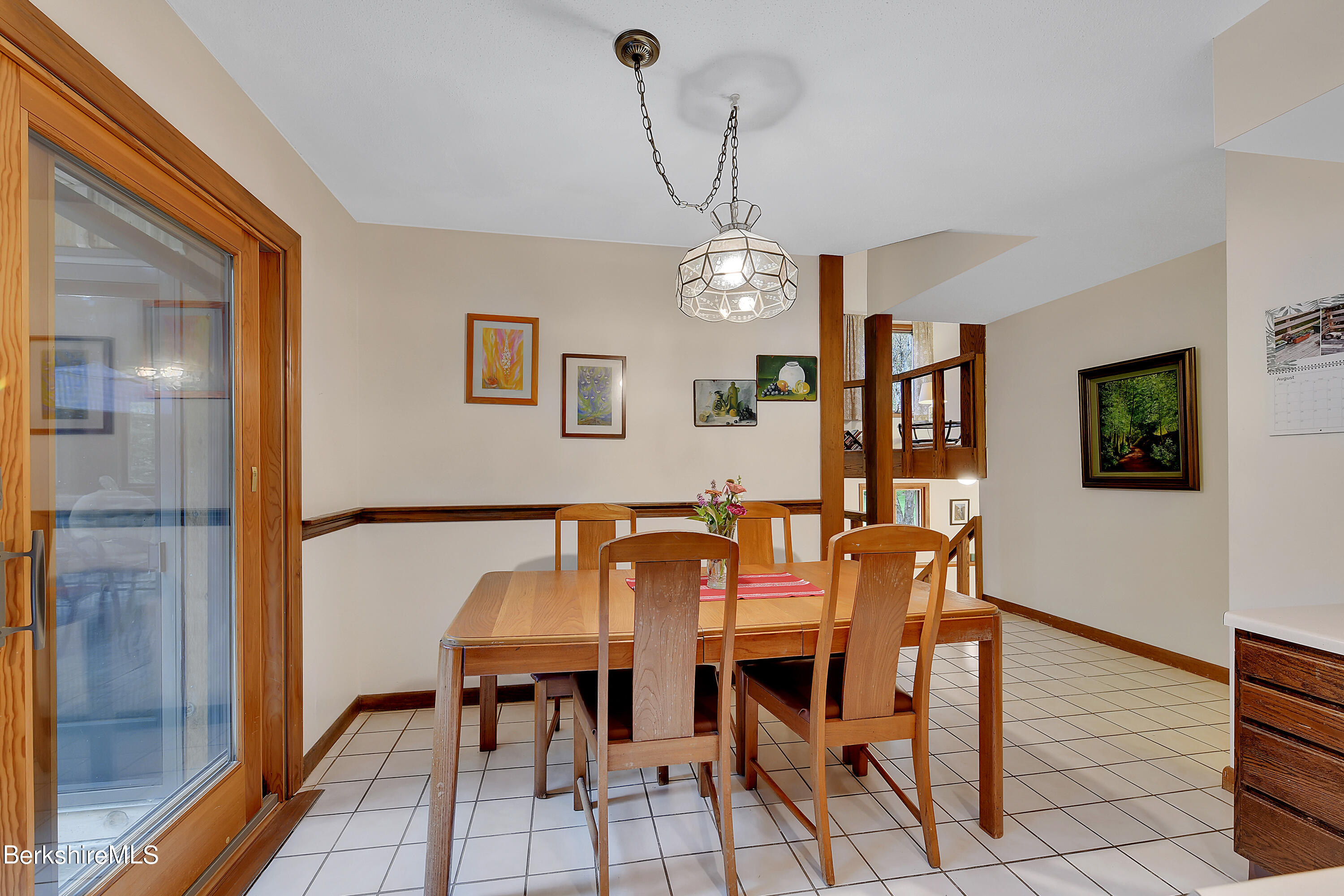 78 Scacebrook Road Richmond, MA 01201 - Photo 16 of 56 a view of a dining room with furniture and chandelier