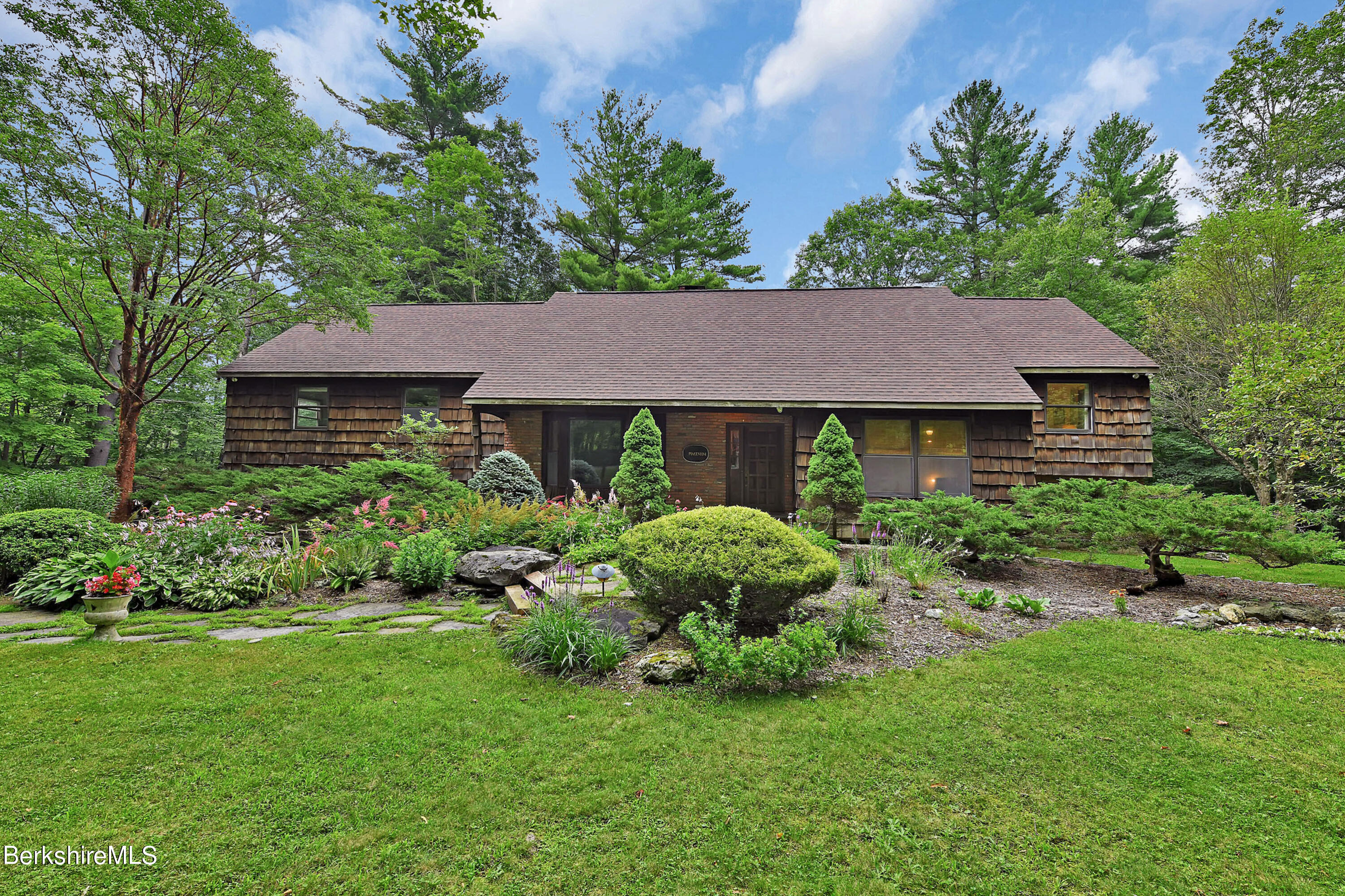 78 Scacebrook Road Richmond, MA 01201 - Photo 50 of 56 a view of a house with a garden and plants