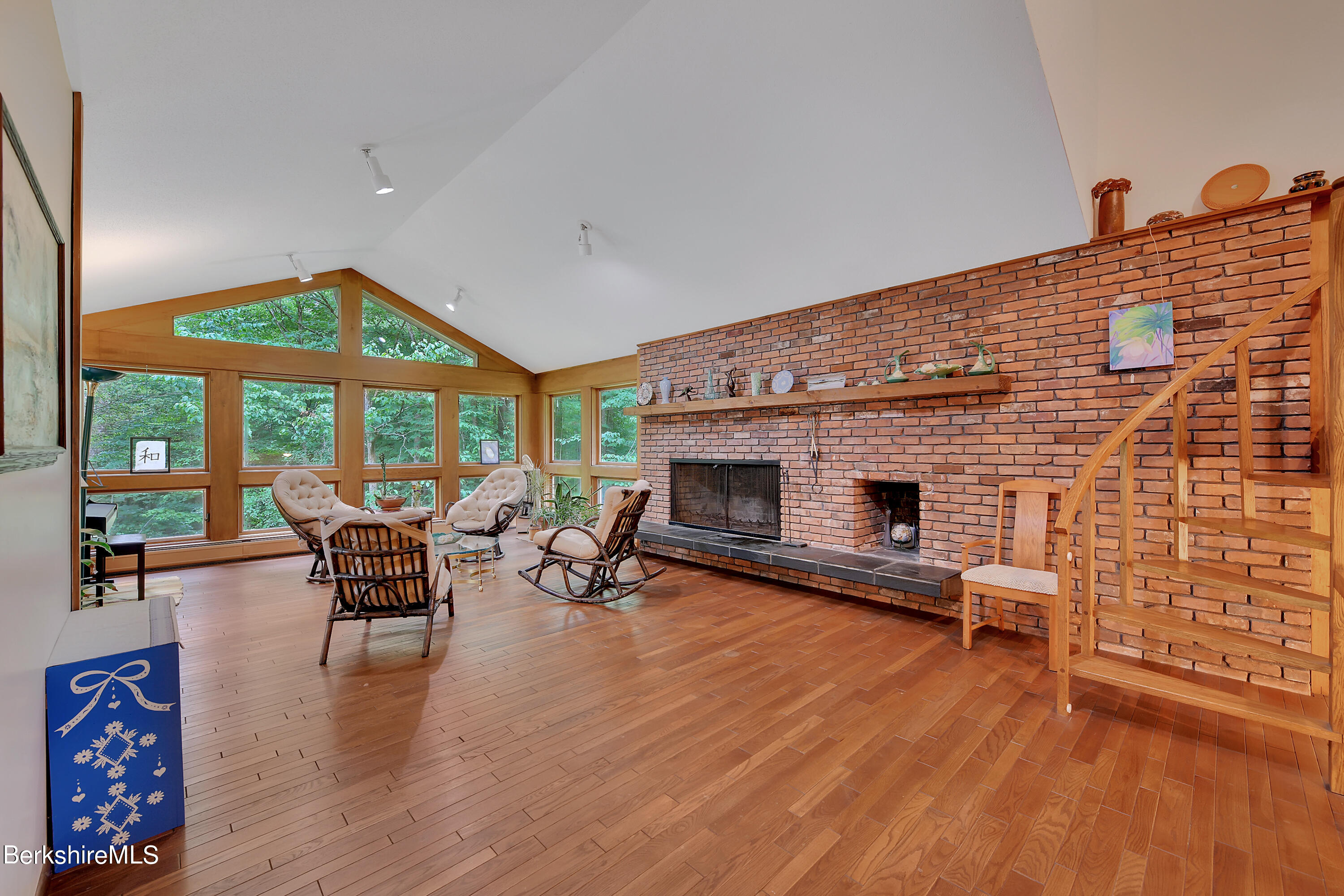 78 Scacebrook Road Richmond, MA 01201 - Photo 10 of 56 a living room with furniture and a fireplace