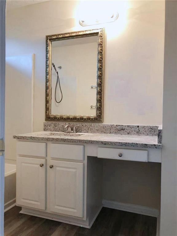 2568 Walden Lake Drive Decatur, GA 30035 - Photo 10 of 16 a bathroom with a sink and mirror
