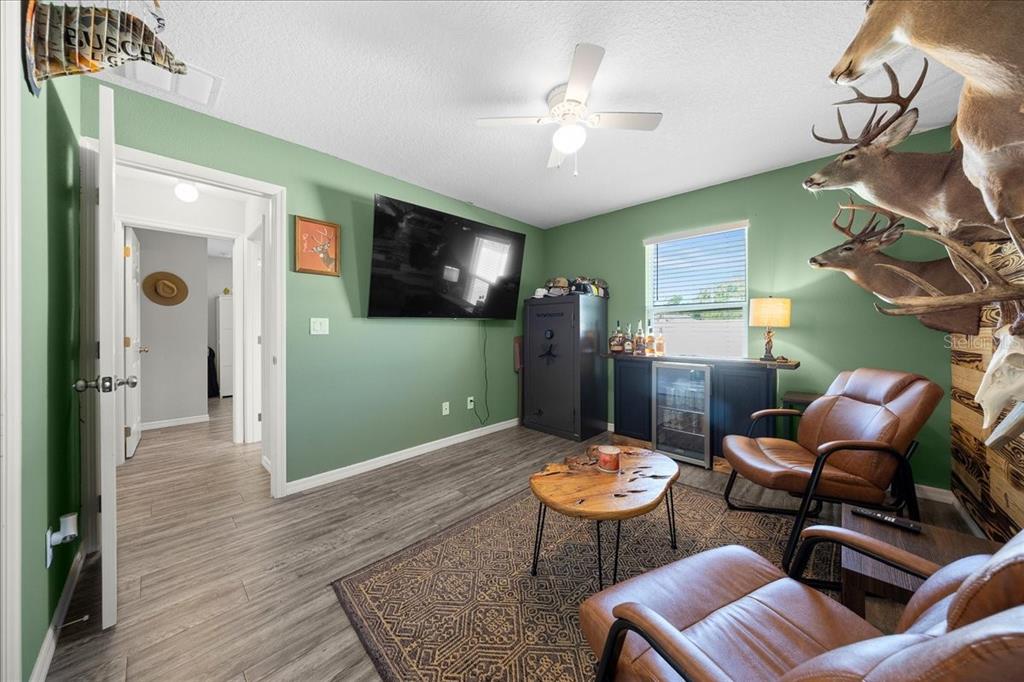 13 Teak Loop Place Ocala, FL 34472 - Photo 36 of 36 a view of a livingroom with furniture and a flat screen tv