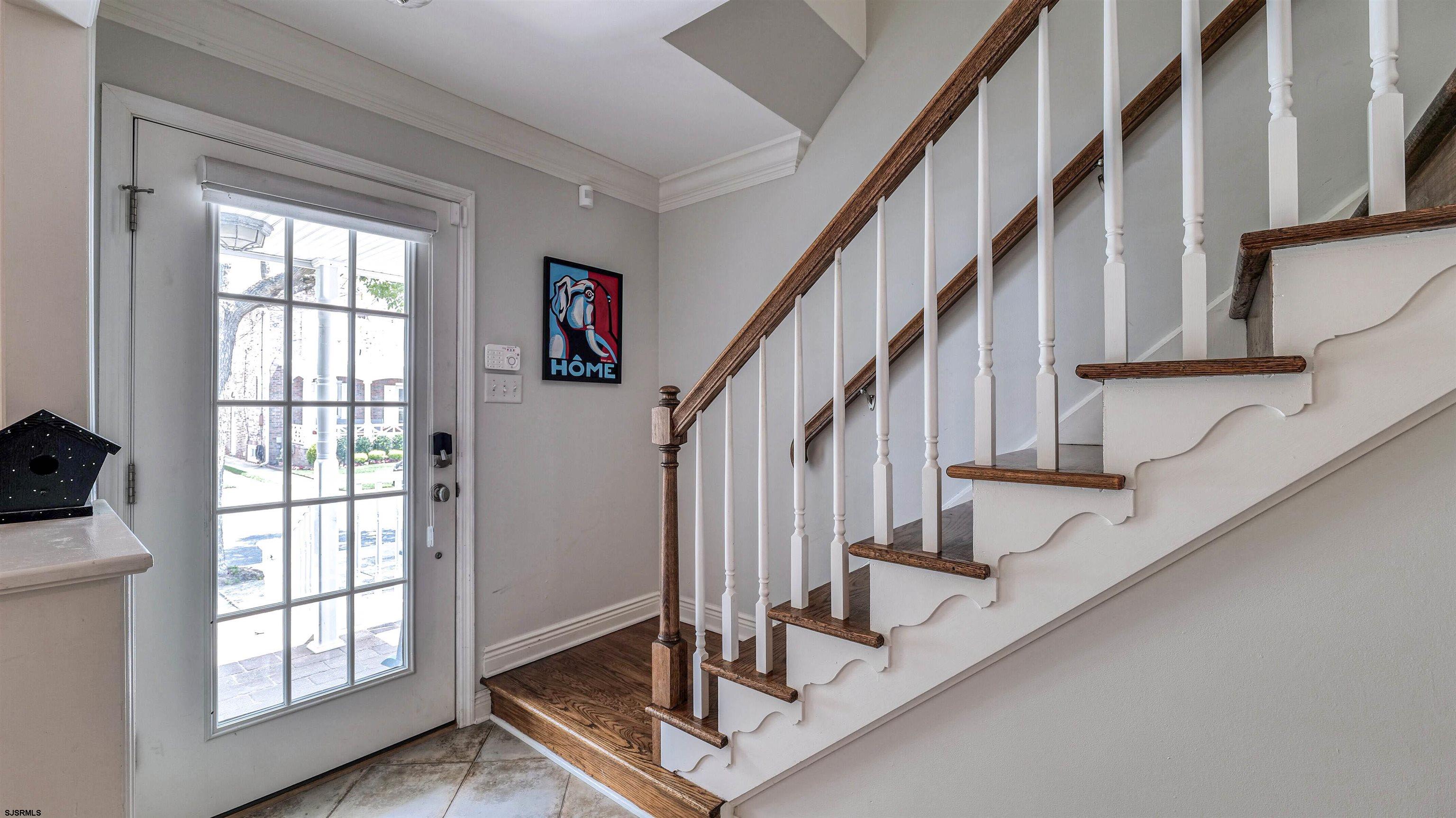 6 North Lancaster Avenue Margate City, NJ 08402 - Photo 6 of 32 a view of entryway and hall with wooden floor