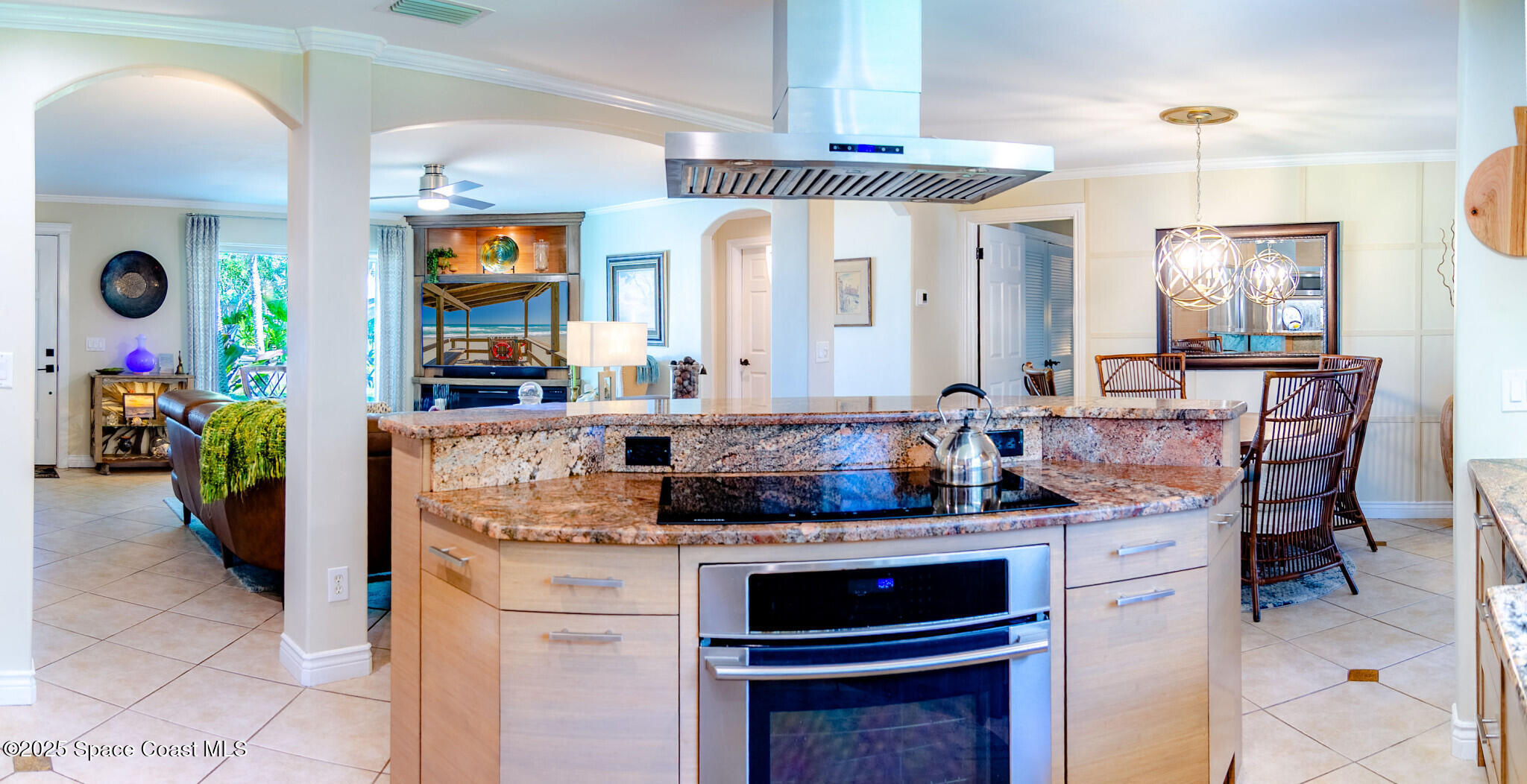 315 Richards Road Melbourne Beach, FL 32951 - Photo 15 of 38 a kitchen with stainless steel appliances granite countertop a stove and cabinets