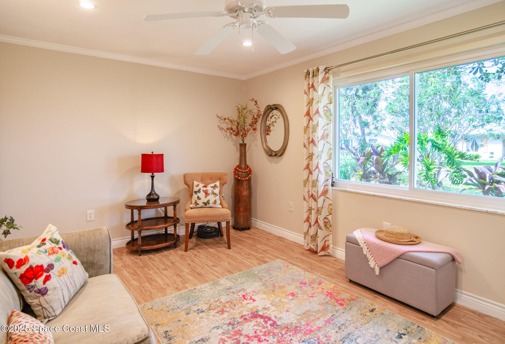 315 Richards Road Melbourne Beach, FL 32951 - Photo 23 of 38 a living room with furniture and a large window