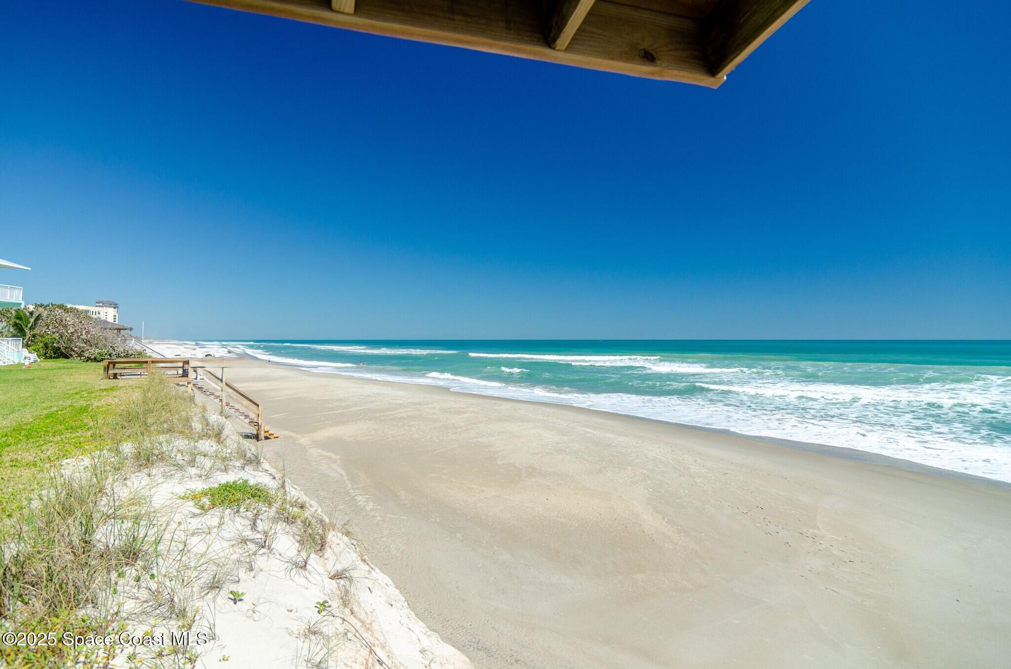 315 Richards Road Melbourne Beach, FL 32951 - Photo 36 of 38 a view of ocean with beach