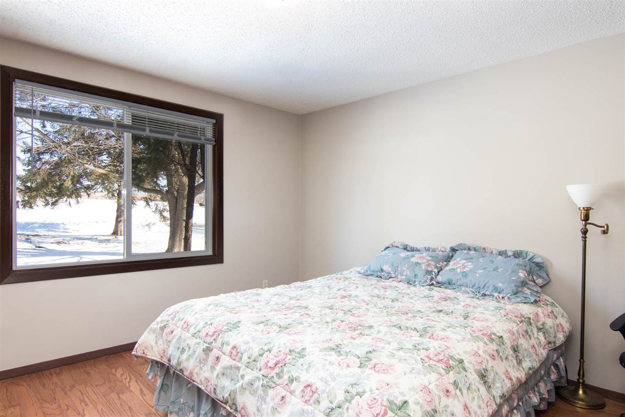 983 Winborne Road Lake Summerset, IL 61019 - Photo 18 of 22 a bedroom with a bed and a large window