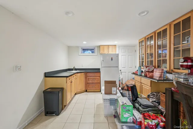 a kitchen with stainless steel appliances granite countertop a stove and a sink