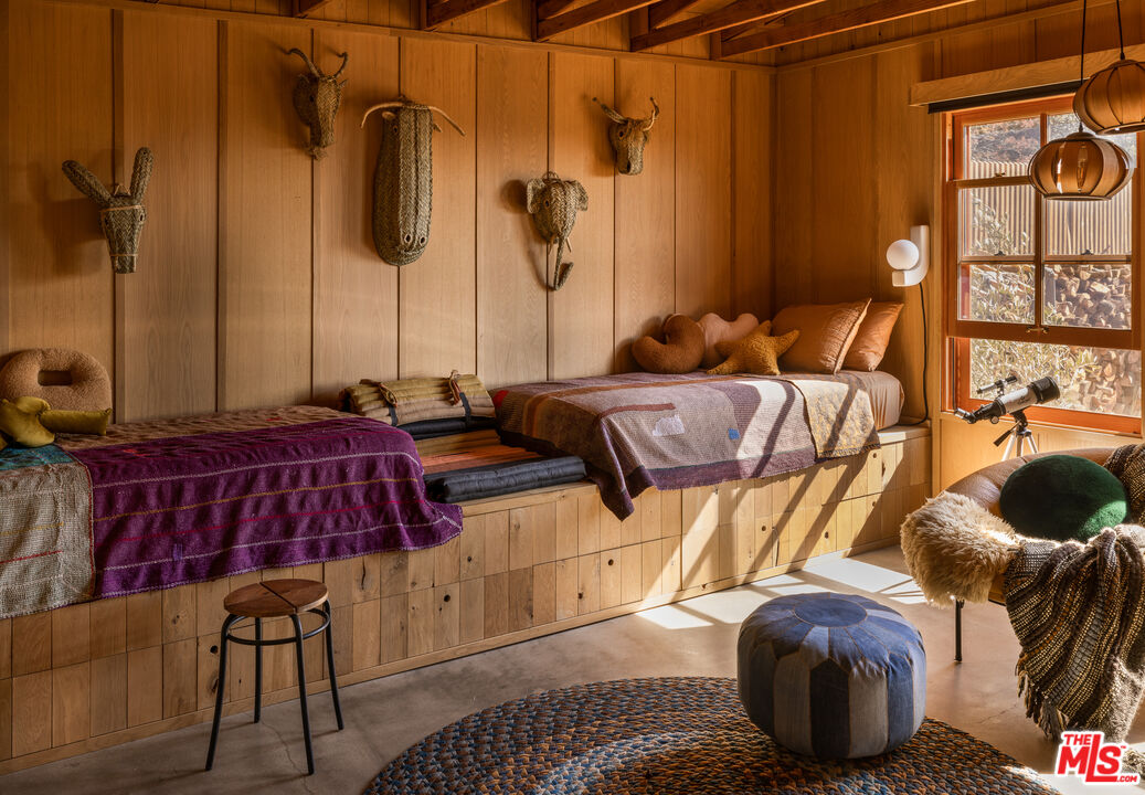 4610 Rising Hill Road Altadena, CA 91001 - Photo 12 of 26 a living room with furniture and a window