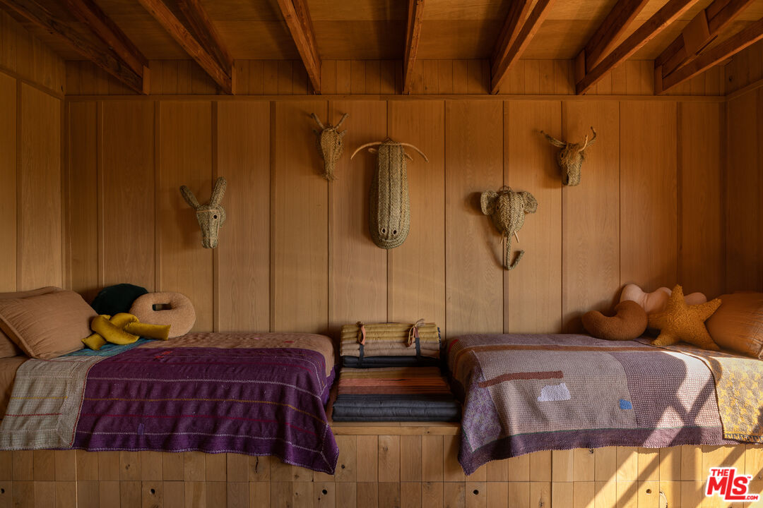 4610 Rising Hill Road Altadena, CA 91001 - Photo 13 of 26 a bedroom with bed and wooden floor