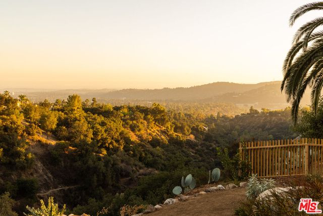 a black and white photo of a bench
