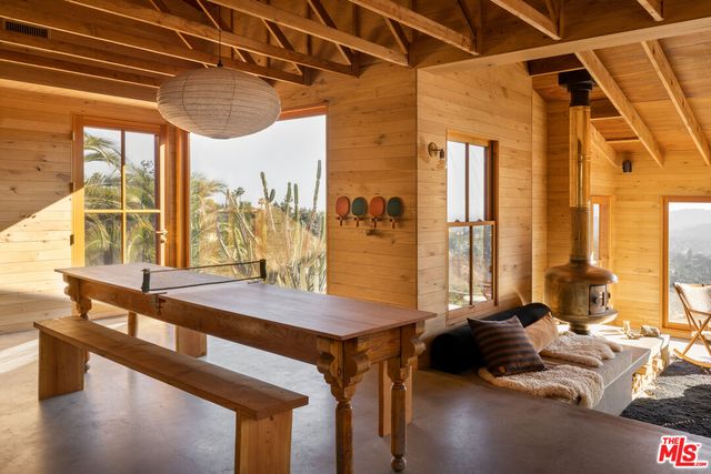 a living room with large window