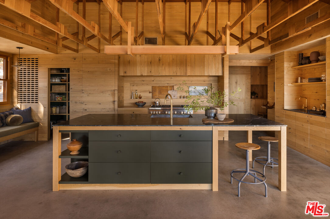 4610 Rising Hill Road Altadena, CA 91001 - Photo 7 of 26 a kitchen with a sink and cabinets