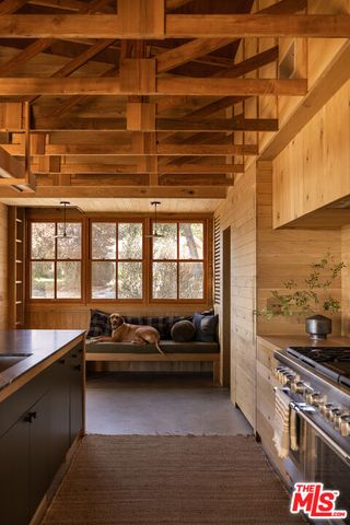 a kitchen with a stove and a sink