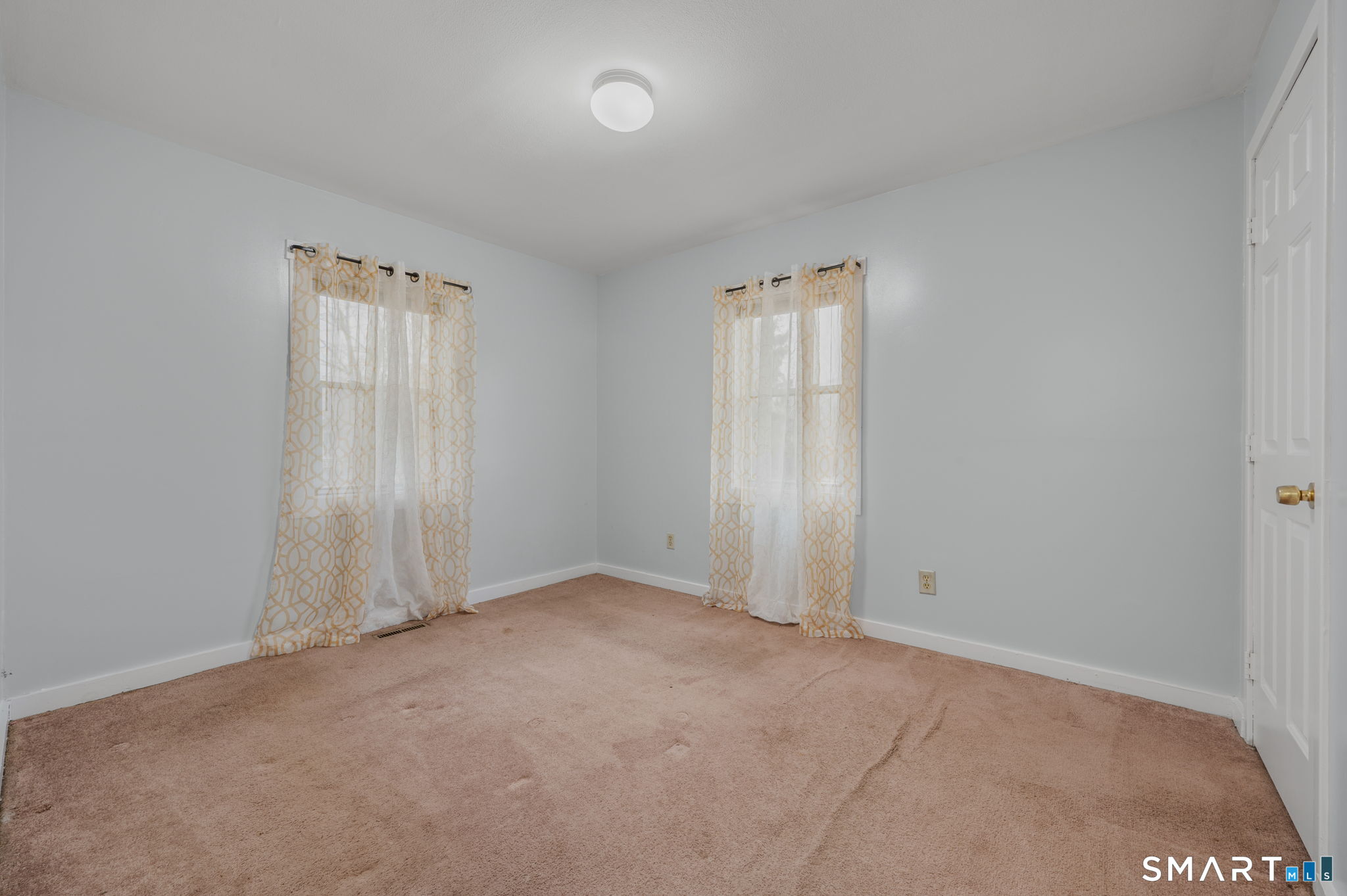275 Midway Ovl Groton, CT 06340 - Photo 14 of 21 an empty room with windows