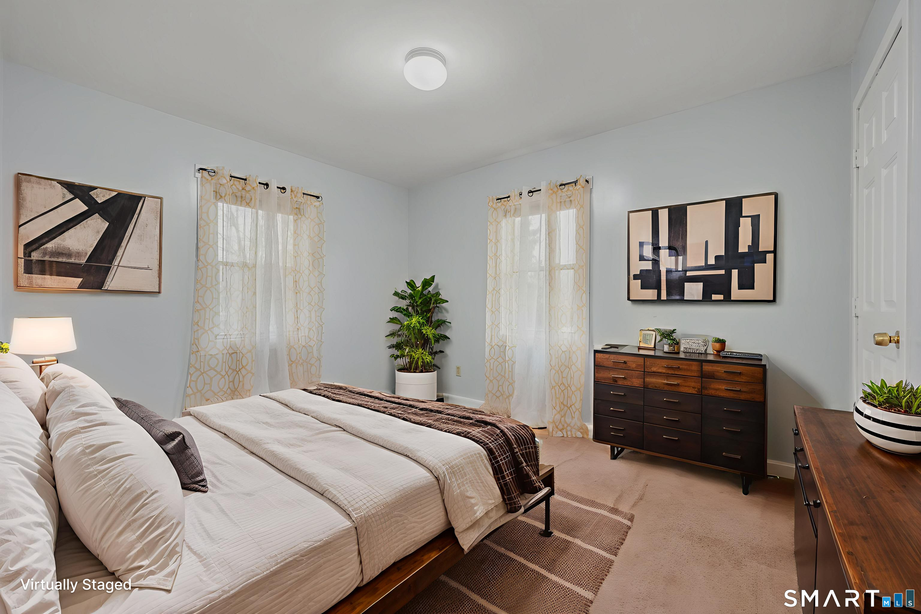 275 Midway Ovl Groton, CT 06340 - Photo 15 of 21 a bedroom with a bed and a painting on the wall