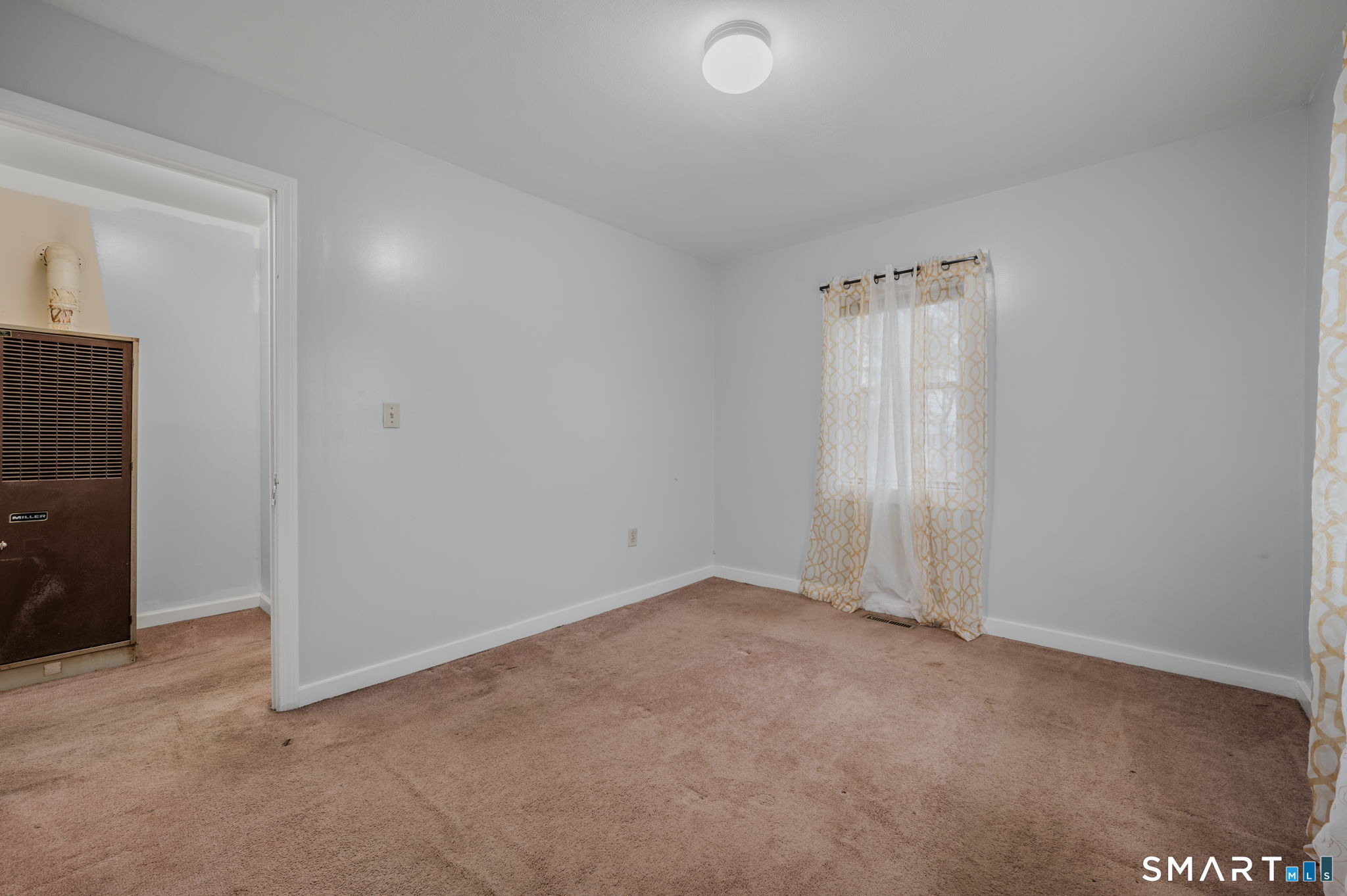 275 Midway Ovl Groton, CT 06340 - Photo 16 of 21 an empty room with windows