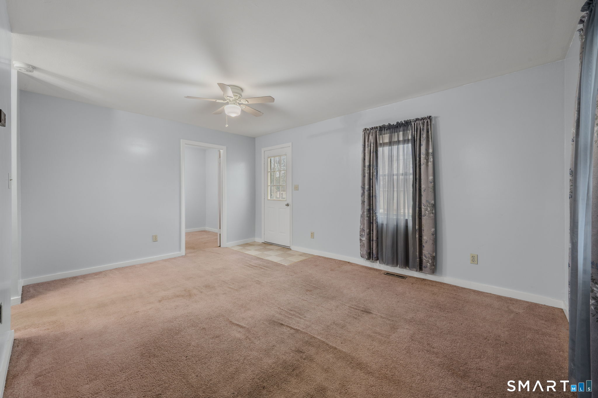 275 Midway Ovl Groton, CT 06340 - Photo 6 of 21 an empty room with closet and a ceiling fan