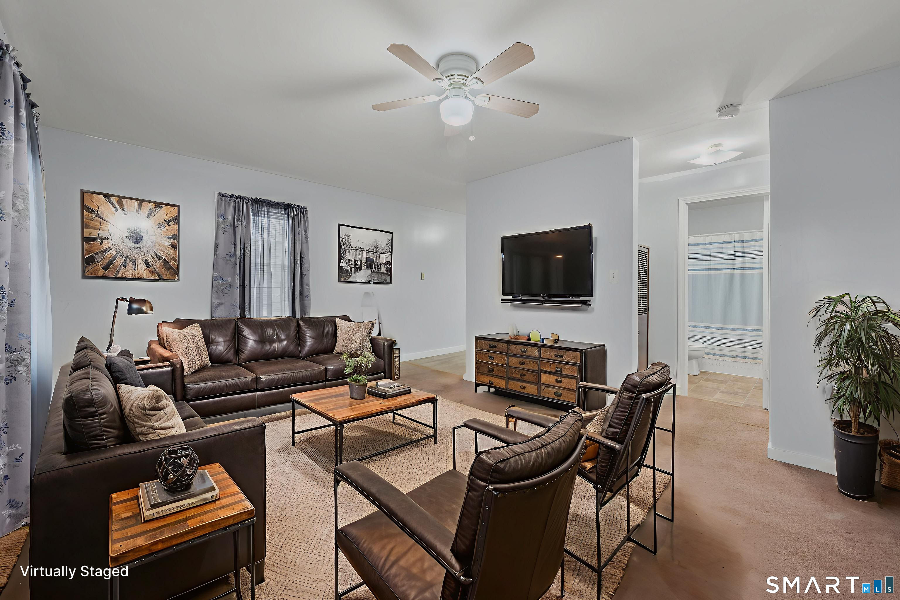 275 Midway Ovl Groton, CT 06340 - Photo 8 of 21 a living room with furniture a flat screen tv and a window