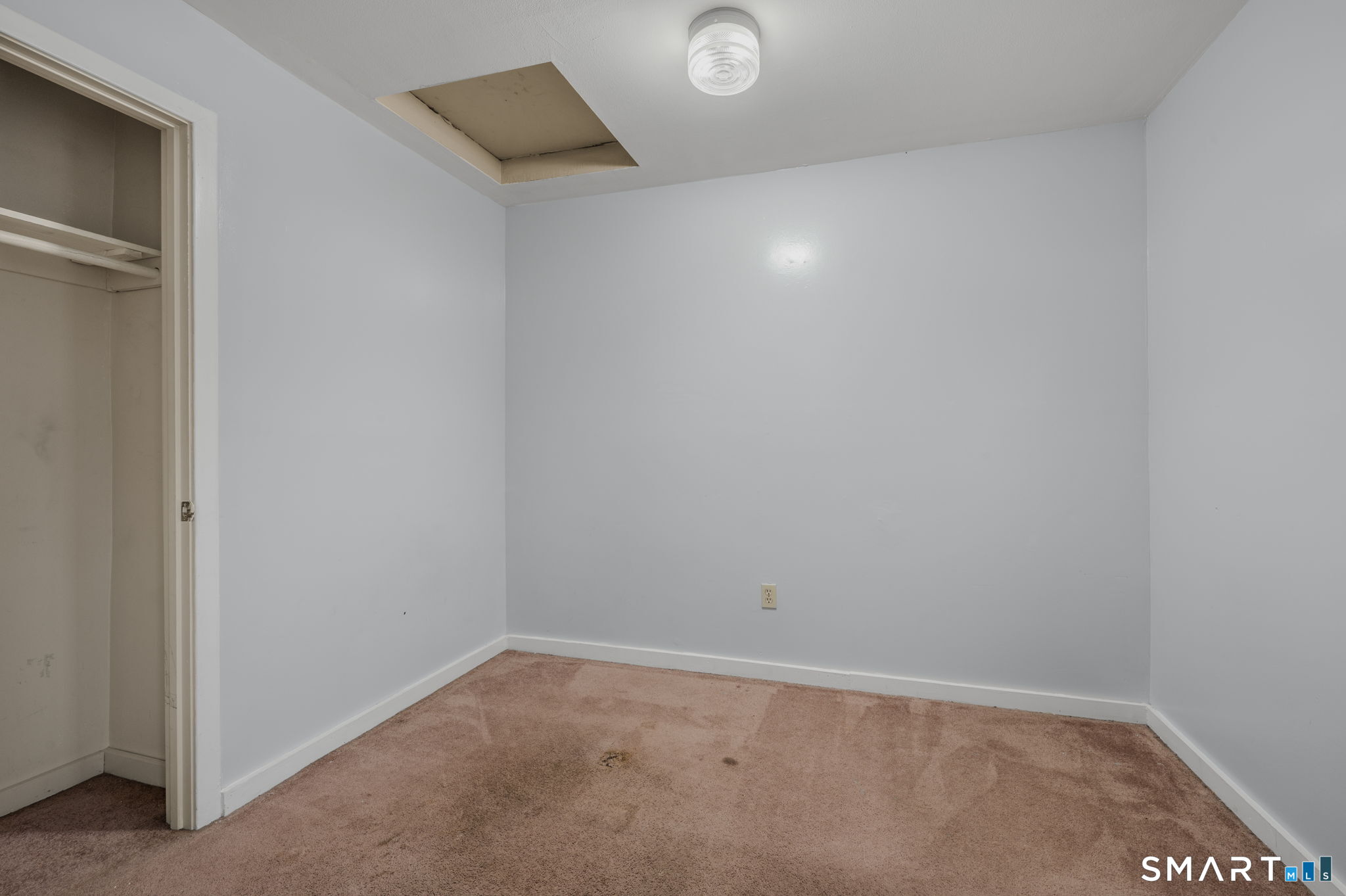 275 Midway Ovl Groton, CT 06340 - Photo 10 of 21 an empty room with windows