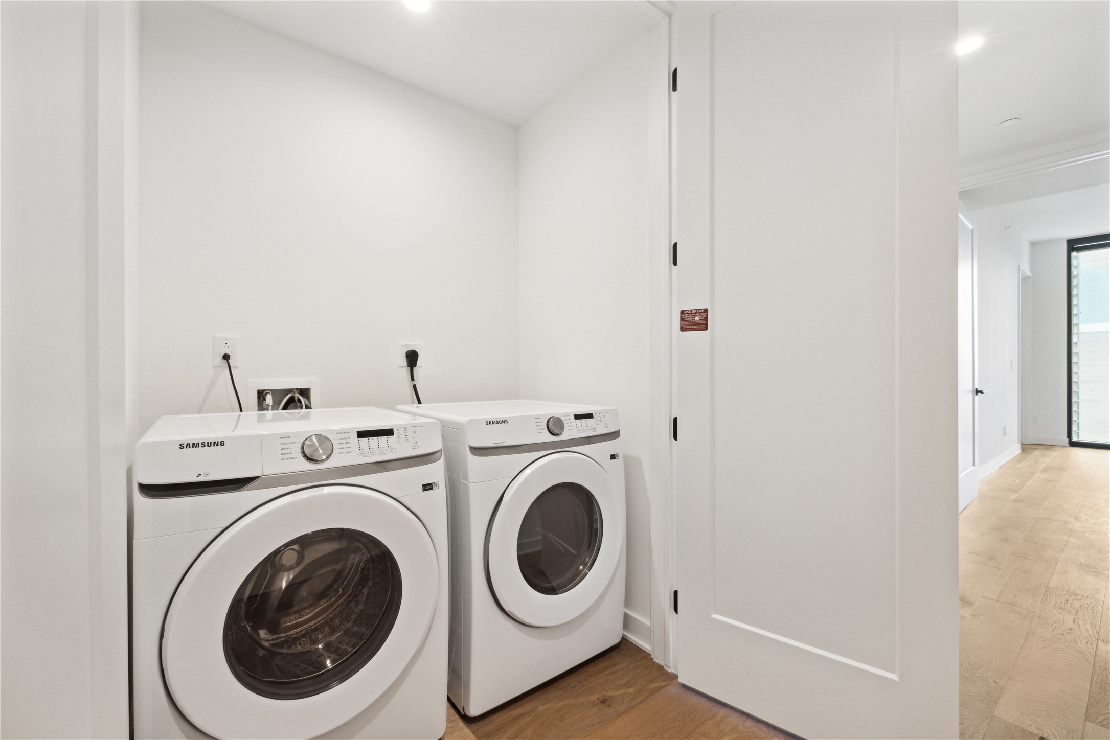 84 East Avenue, Unit 3009 Austin, TX 78701 - Photo 17 of 39 a utility room with dryer and washer