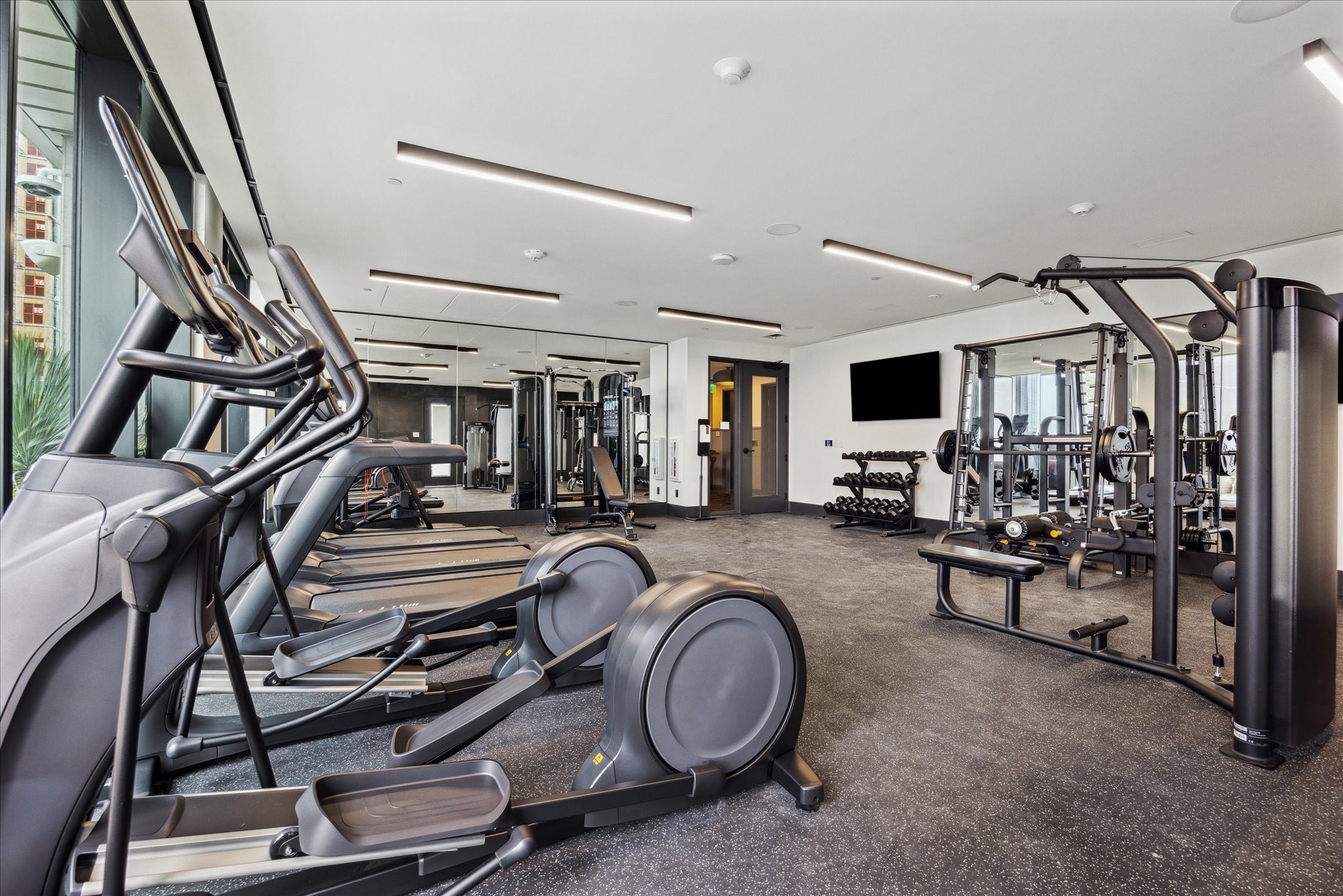 84 East Avenue, Unit 3009 Austin, TX 78701 - Photo 18 of 39 a view of a room with gym equipment