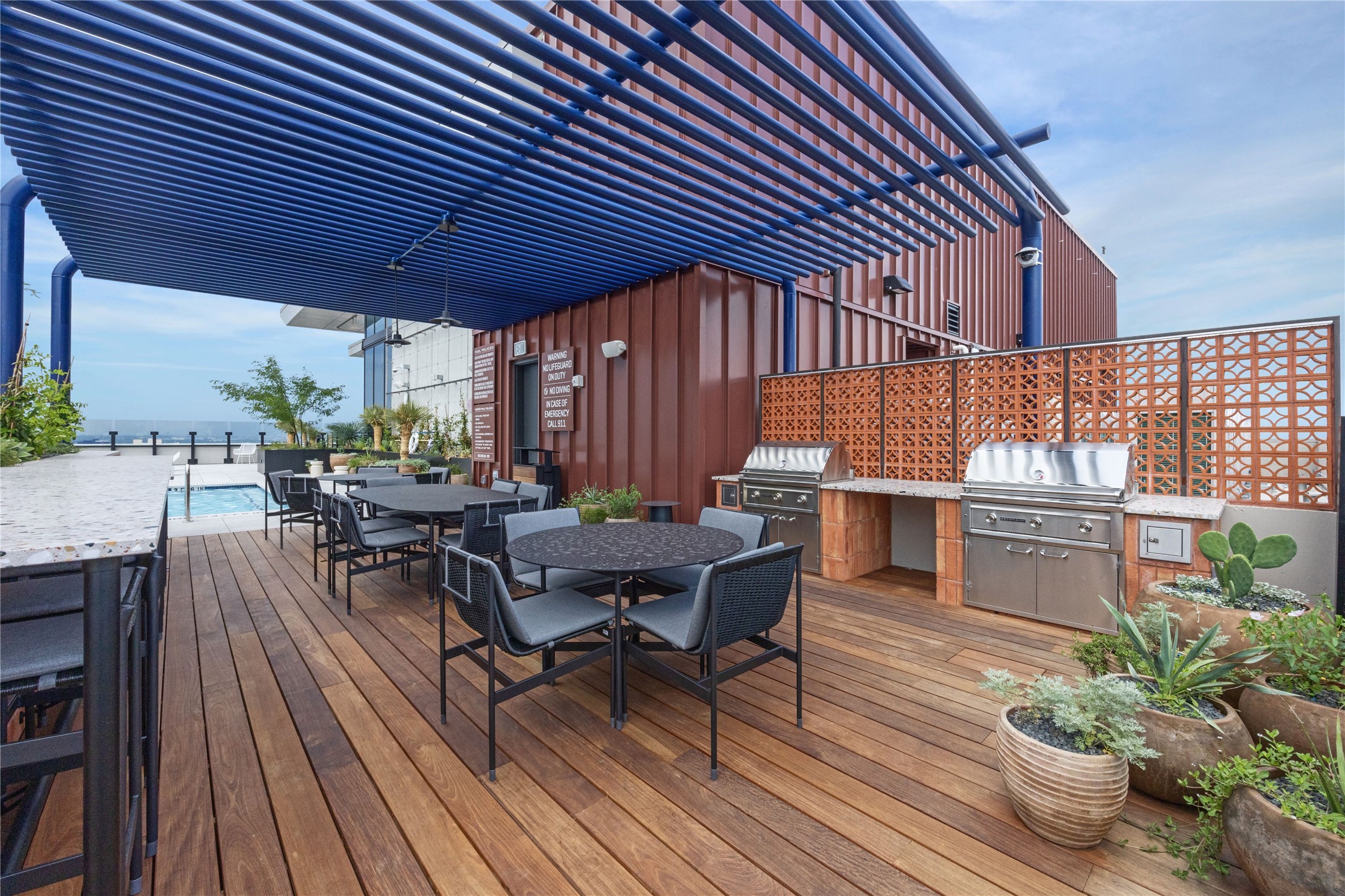 84 East Avenue, Unit 3009 Austin, TX 78701 - Photo 35 of 39 a dinning table and chairs in patio of the house