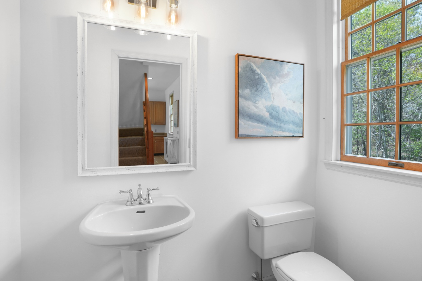 2 Cosmos Way Edgartown, MA 02539 - Photo 15 of 29 a bathroom with a toilet sink and mirror