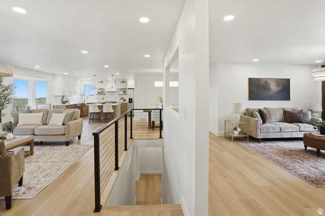 8760 Rustler Road Cottonwood Heights, UT 84093 - Photo 20 of 57 Bright living areas featuring light wood-finish flooring and recessed lighting