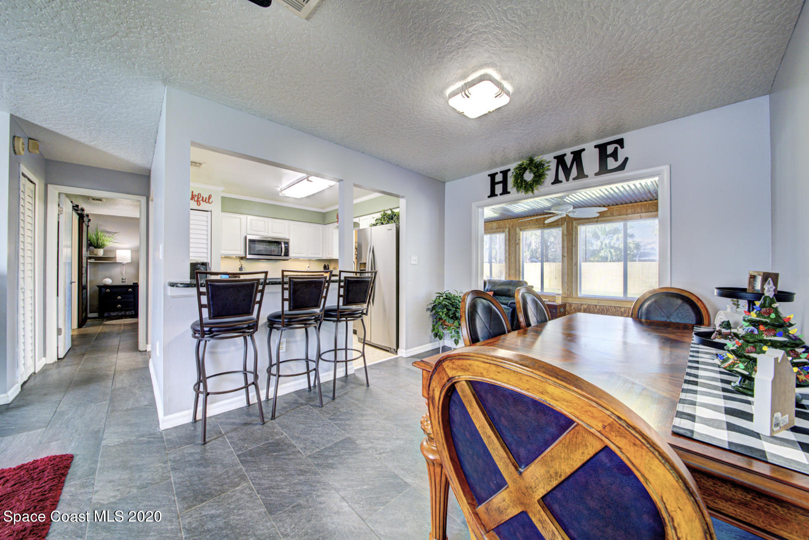 5130 Holden Road Cocoa, FL 32927 - Photo 13 of 49 dining room & breakfast bar