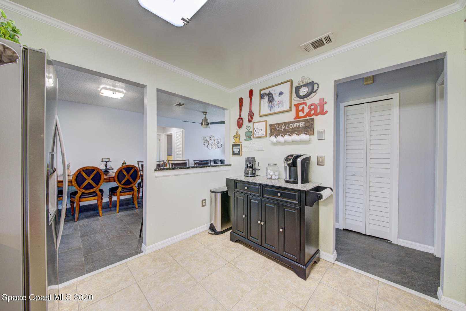 5130 Holden Road Cocoa, FL 32927 - Photo 17 of 49 kitchen open to dining room