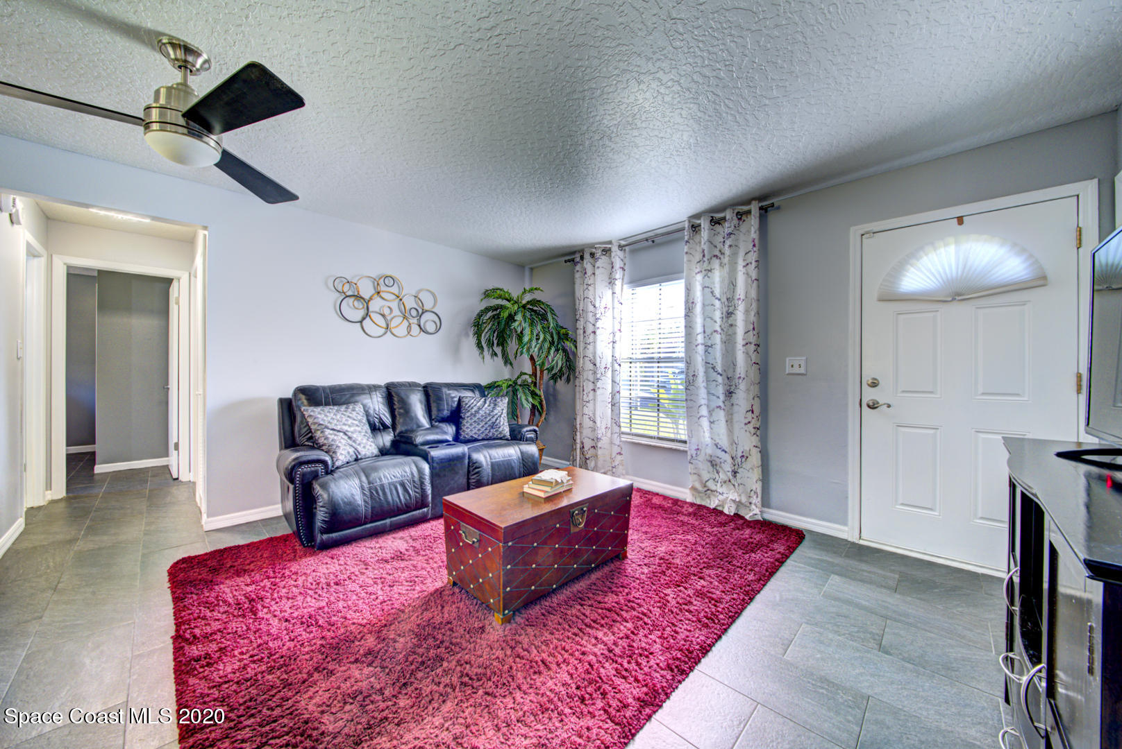 5130 Holden Road Cocoa, FL 32927 - Photo 8 of 49 living room & front door