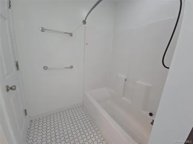 a bathroom with a bathtub