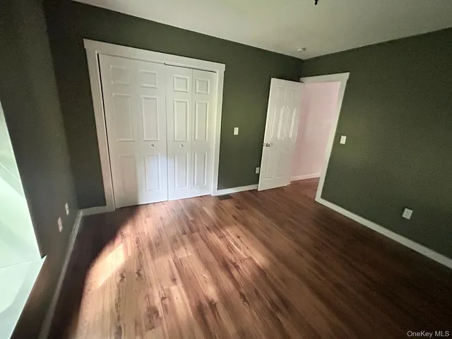 wooden floor and windows in a room