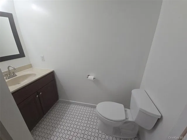 a bathroom with a sink and a toilet