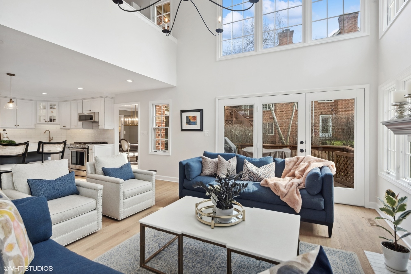 853 Seminary Circle Glen Ellyn, IL 60137 - Photo 12 of 26 a living room with furniture kitchen view and a large window