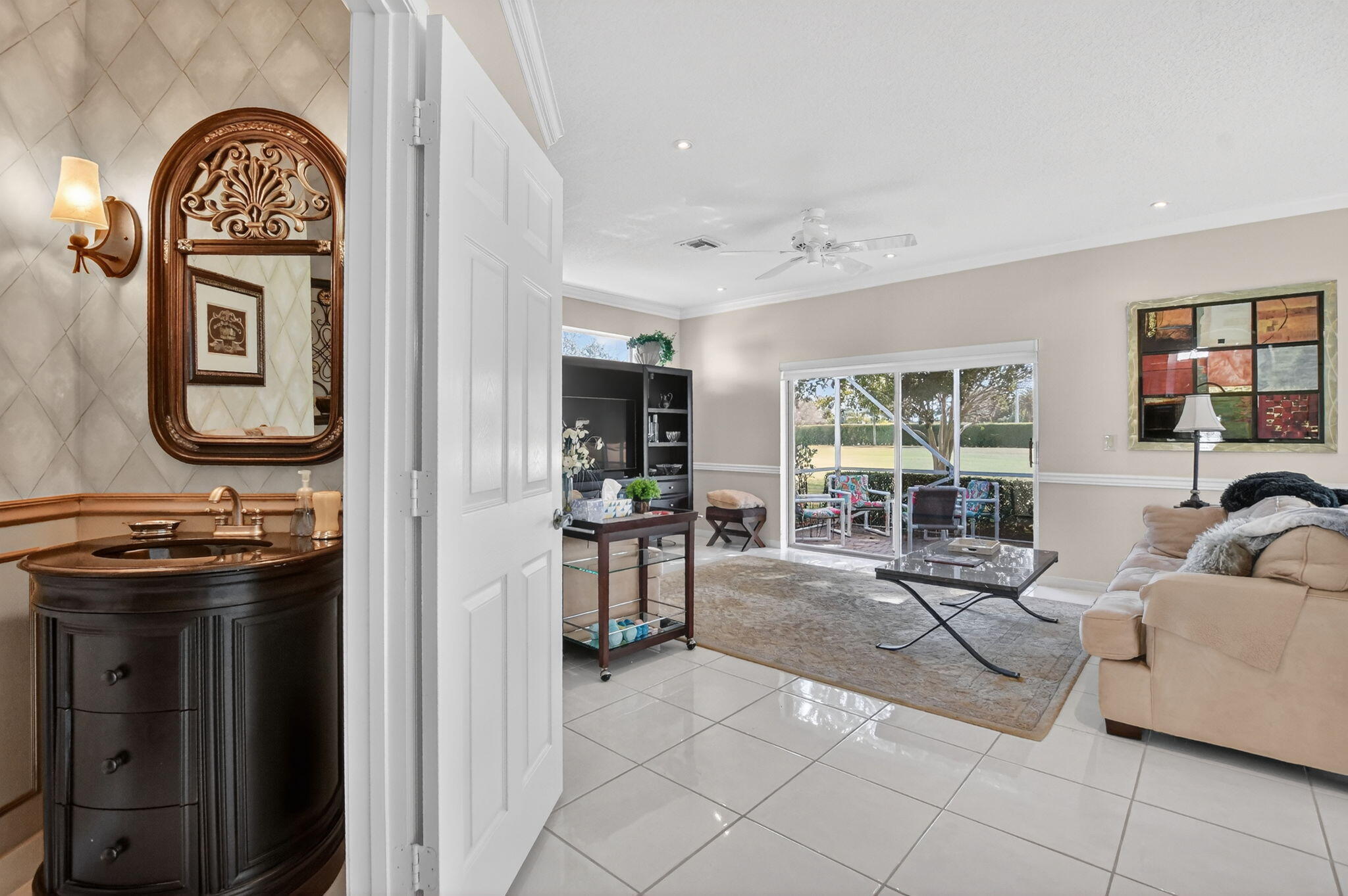 7323 Panache Way Boca Raton, FL 33433 - Photo 21 of 46 a living room with furniture a fireplace and a flat screen tv