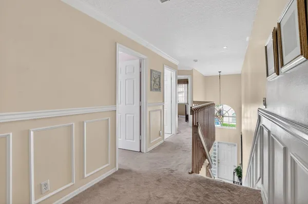 a view of a hallway with workspace