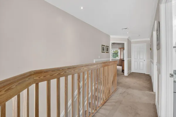 a view of a hallway with workspace