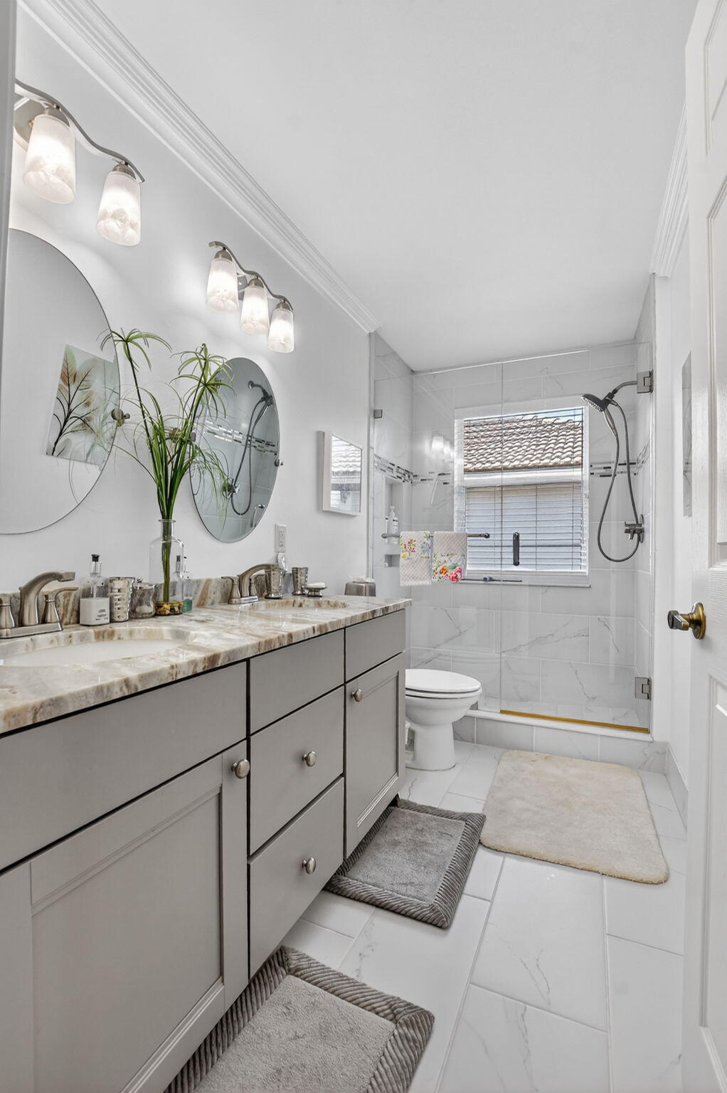 7323 Panache Way Boca Raton, FL 33433 - Photo 34 of 46 a spacious bathroom with a granite countertop sink mirror and toilet